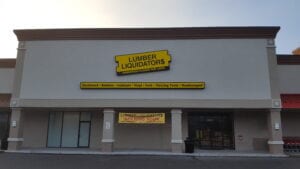A building with the words lumber liquidators on it.